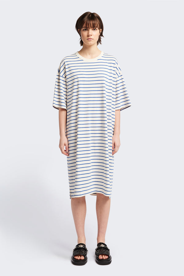 The Nadir Dress is a laid back style and made from pure cotton jersey. This knee length dress features blue and white stripes and is the perfect summer throw on style. 