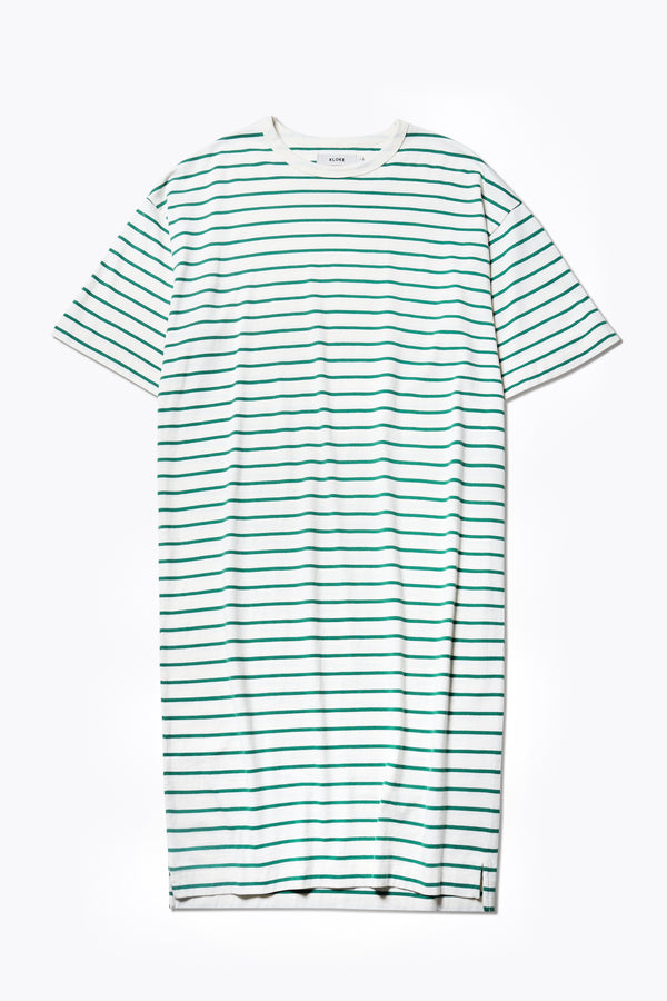 Flat lay of the Nadir Dress Green Stripe, a summer style made from pure cotton jersey. Featuring side-splits, dropped shoulder, and up-sized elbow-grazing sleeves. 