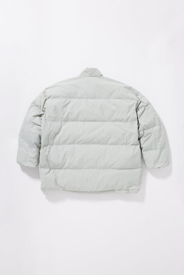 Flat back of the Vintage black Nimbus Kimono Jacket  with centre-front self-tie, showing quilted recycled down construction and wrap silhouette