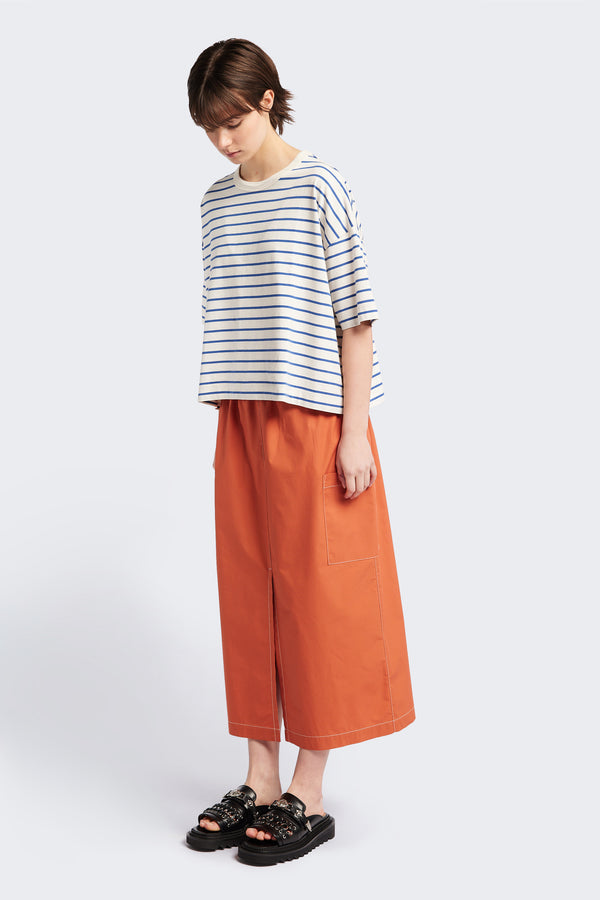 The Obelisk Tee is a boxy relaxed shape t-shirt. Cut in a soft organic cotton jersey in Blue and White Stripe, with a thick 1 x 1 rib bound cover stitched neckline and straight hem. 