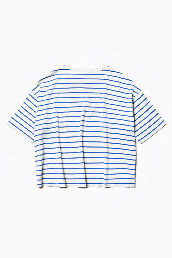 The back of the Obelisk Tee Blue Stripe.  Cut in a soft organic cotton jersey, this boxy t-shirt has a thick 1 x 1 rib bound cover stitched neckline and straight hem