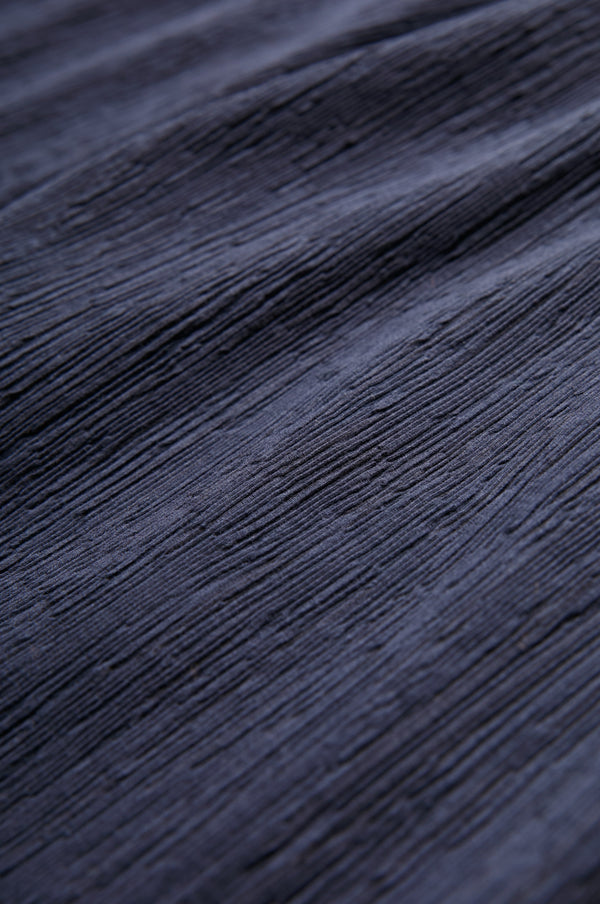 Close up of the special crinkle fabric Ink for the Oracle Crinkle Pant. 