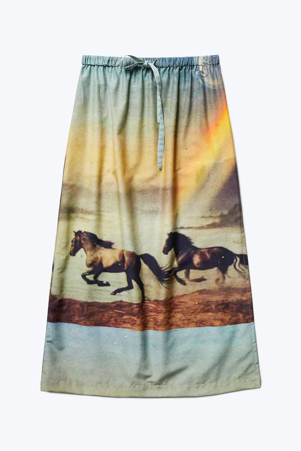 Flat lay of the Outpost Skirt Cosmic Print, a mid-length, straight style skirt with an elasticated waistband and tie. This skirt is made from 75% Cotton, 25% Silk.