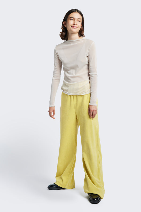 The Prone Towelling Track Pant is a slouchy track pant made from Okeo-tex standard cotton terry in Butter Yellow.  