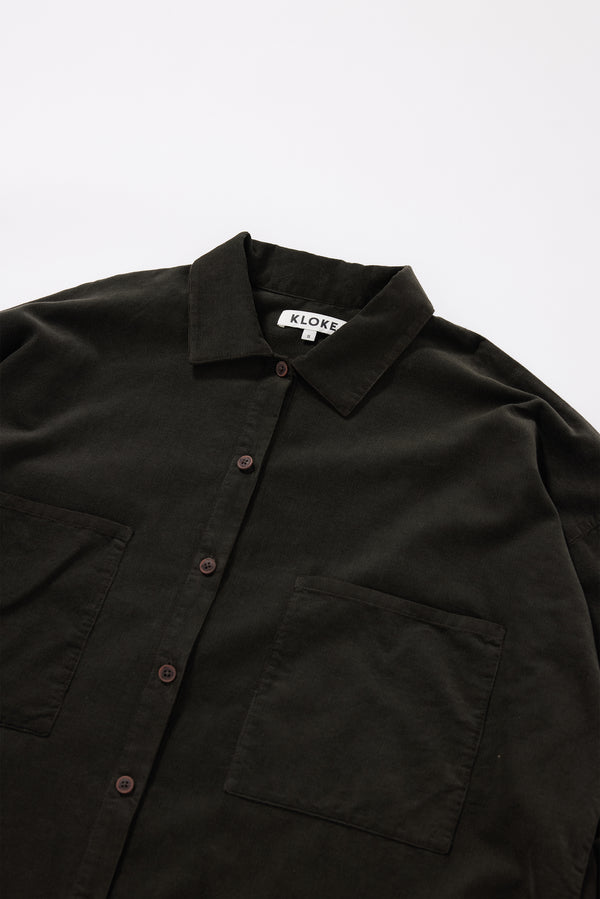 Close-up of the structured edge-stitched stand collar on the Refraction Cord Shirt in Brown double over-dyed cotton corduroy
