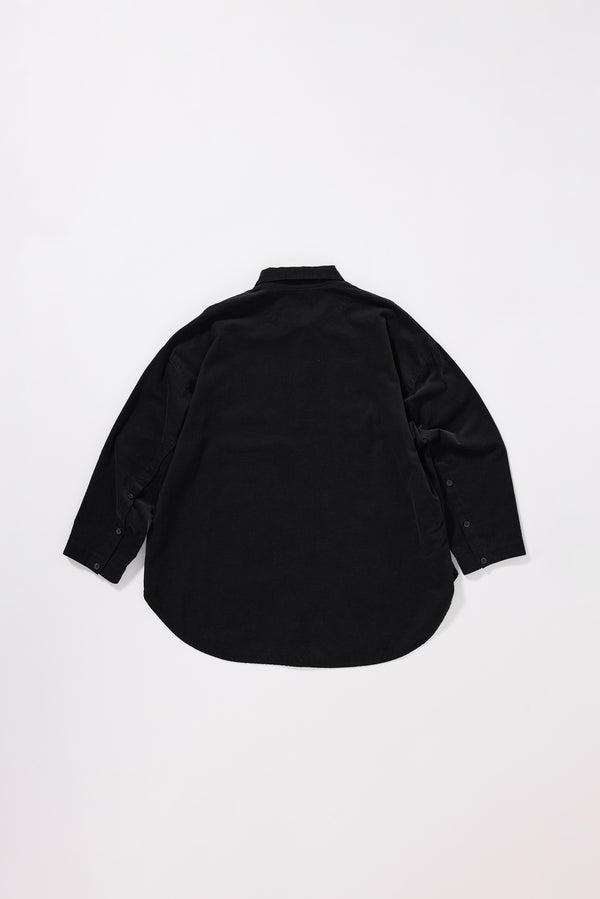 Flat Back view of the Refraction Cord Shirt in Brown showing dropped sleeve silhouette, rounded hemline and deep colour from garment double over-dye process