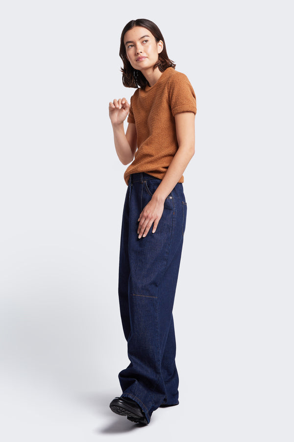 A baggy jean cut from Japanese denim in Indigo. The comfortable Reset Jean features two darts at the centre front waistline and darts across the knee.