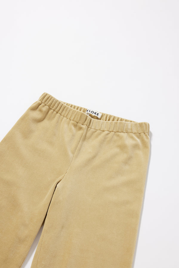 close-up of  Sedate Lounge Pant in yellow, Japanese stretch corduroy velour fabric