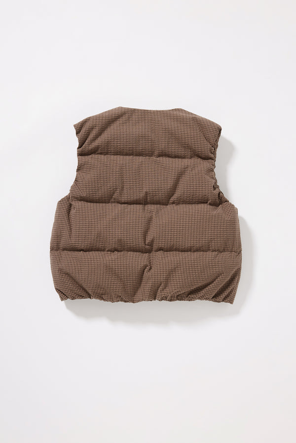 Flat Back view of the brown quilted down vest featuring a softly gathered elastic hem and clean quilted finish.