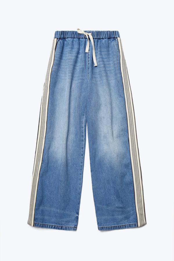 Flat lay of the front of the Tribute Side Trim Pant Mid Blue Fade. These casual wide leg pants have an elasticated waist with tie and front and rear patch pockets. Finished with side stripe trim detail.