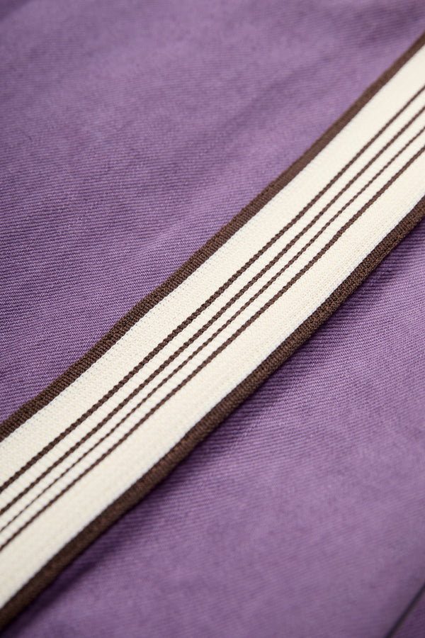 The side stripe trim detail on the Tribute Side Trim Pant Purple. Made from softened cotton. 