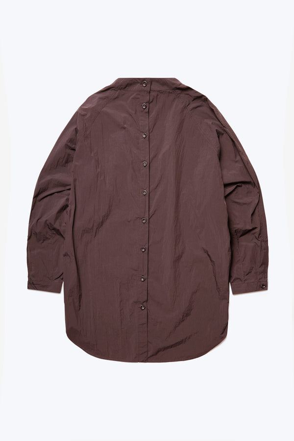 The back of the women's Waking Blouse Cocoa Brown is made from 100% nylon and features a centre back button opening.