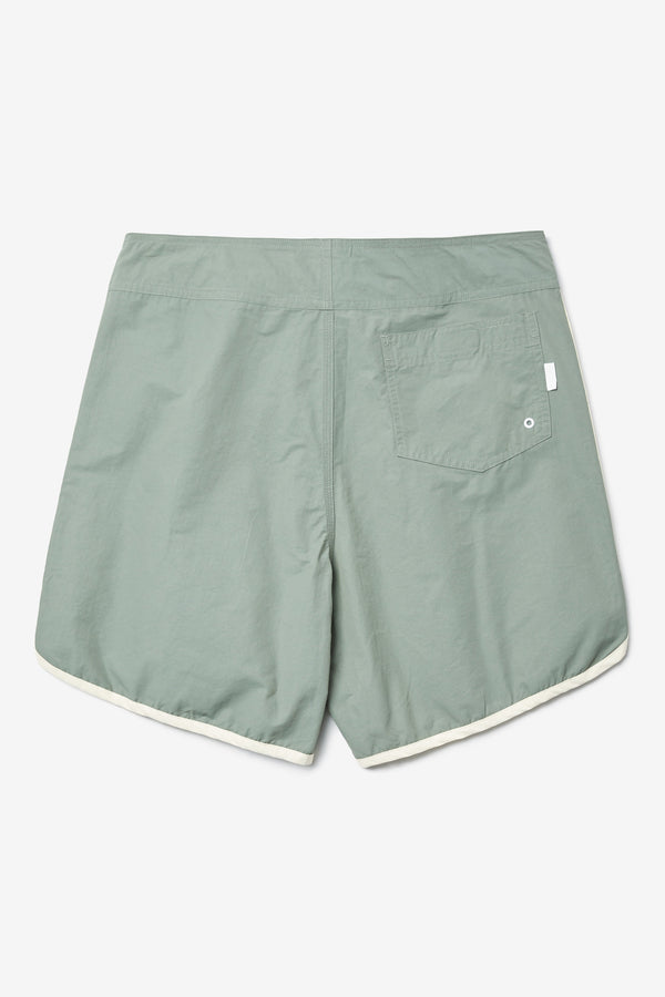 Back of The Hybrid Board short in Sage Green, made from a functional technical cotton/nylon thats durable, stashable and quick-drying. Featuring back patch pocket with Velcro closure. Available in 5 sizes. 