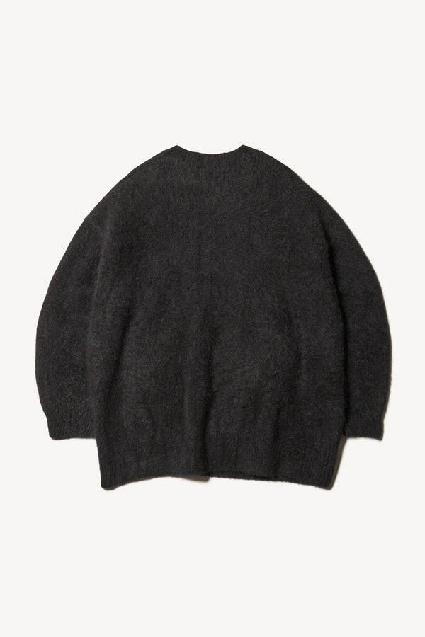 Flat Back of the Marlin oversized fluffy alpaca knit crew neck sweater in black. 
