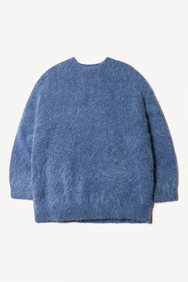 Flat Front of the Marlin, oversized fluffy knit crew neck sweater in indigo blue. 
