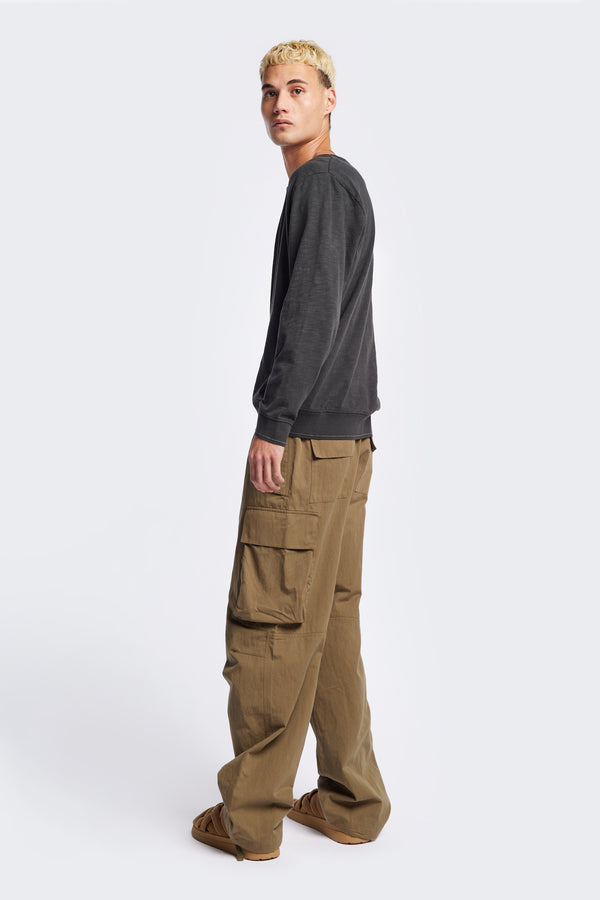Mens Modulate Cargo Pant in Olive brown, side view 
