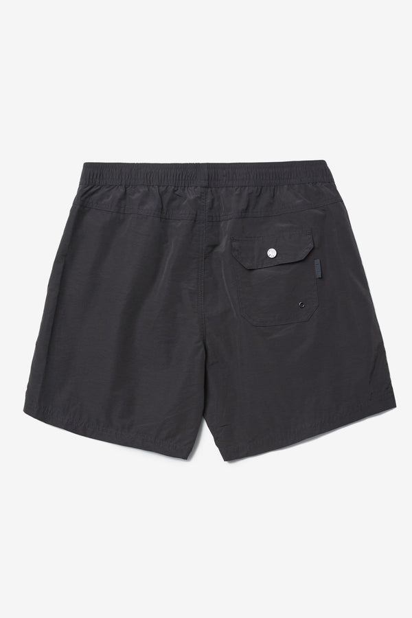 Back of The New Wave Short in Black. Swim shorts with elastic drawstring waist, internal mesh support, and front slant pockets. Available in 5 sizes.