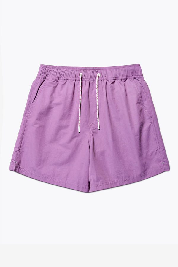 The New Wave Short in Purple Fade. With Utilitarian features like an elastic drawstring waist, internal mesh support, front slant pockets, and back patch pocket. Available in 5 sizes.