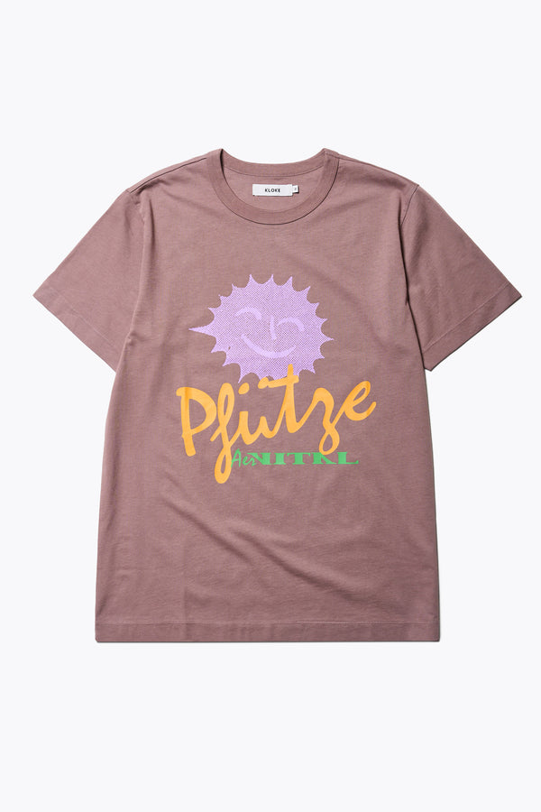 The Pfutze Print T Shirt in Cocoa Brown. A classic t-shirt cut from a soft cotton jersey, with a thick rib neckline and straight hem. Available in 5 sizes. 