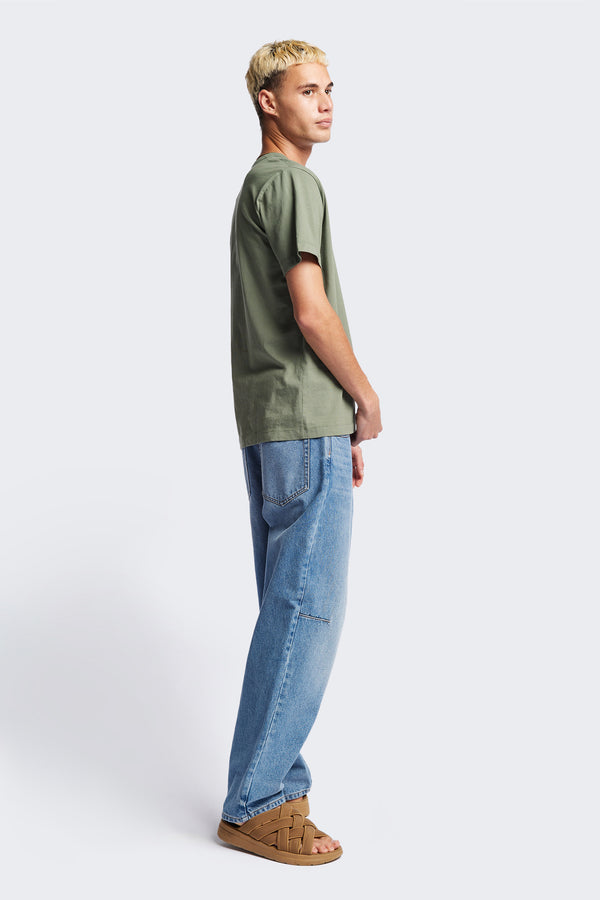 The Radius T-Shirt is a traditional men's tee with 1 x 1 rib-bound cover-stitched neckline that's reinforced at the back. Made from 100% organic cotton in Sage Green. Available in 5 Sizes. 