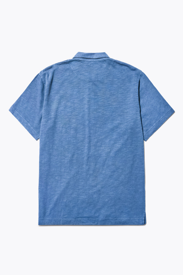 Back of The Tectonic Shirt in blue, a classic boxy fit T-Shirt made from 100% cotton garment dyed jersey with a reinforced back yoke. Available in 5 sizes. 