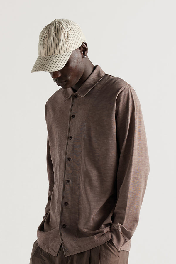 Men - Stipe Cap in ecru and Black strip on male model 