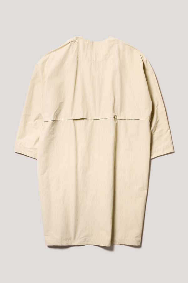 Flat Back view of the Stone Locate Jacket, with centre-front button closure and rounded neckline.