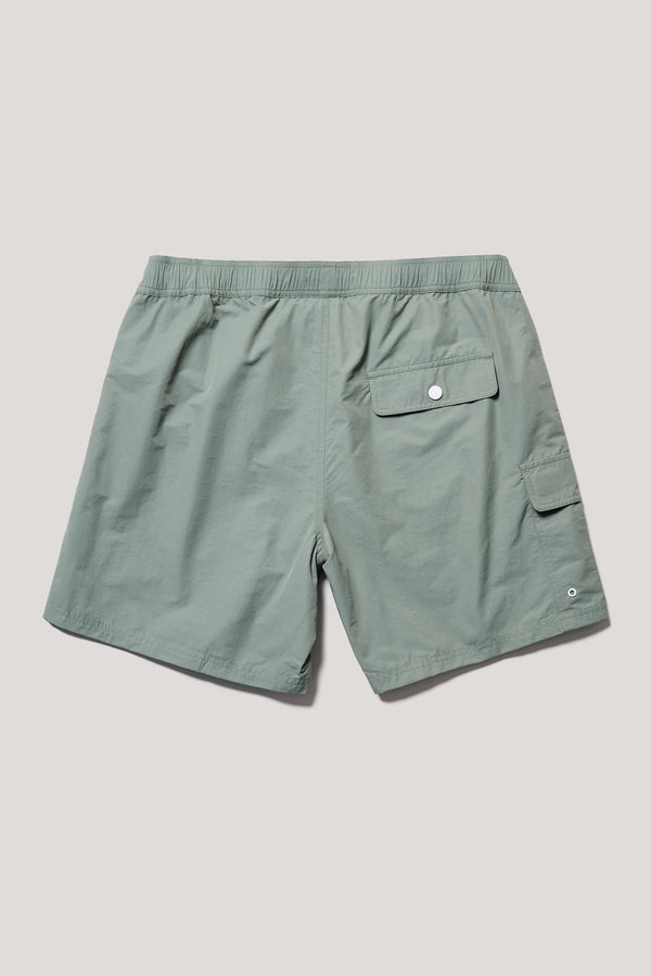 flat back of relaxed fit swim shorts in Olive green with an elastic drawstring waist and functional pocket detailing.