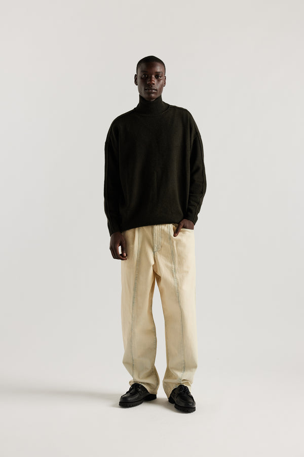 the Mid Blue Fade with Ecru Tint Impact Denim Pant in lightweight denim, front view showing wide tapered leg, elastic waistband, and traditional front pockets.