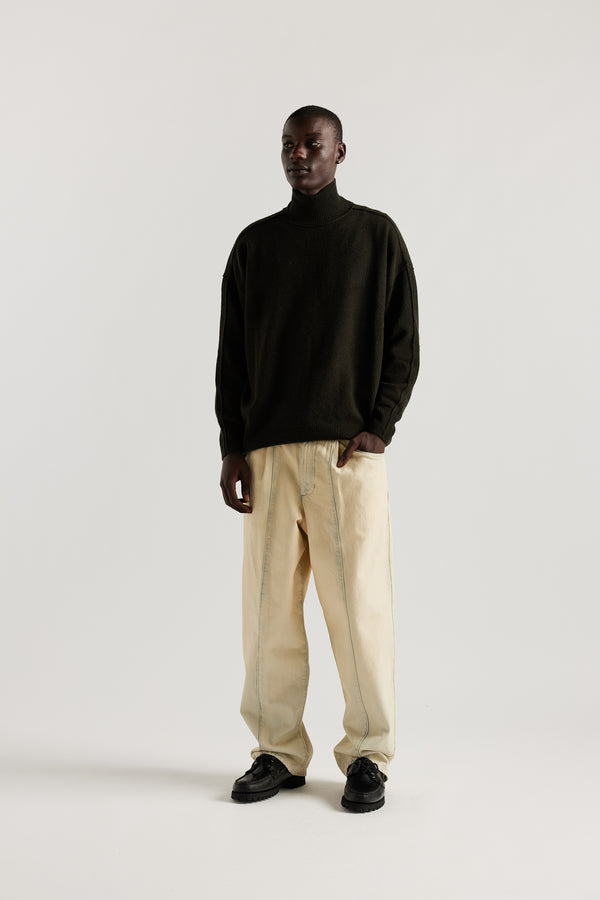 the Mid Blue Fade with Ecru Tint Impact Denim Pant in lightweight denim, front view showing wide tapered leg, elastic waistband, and traditional front pockets.