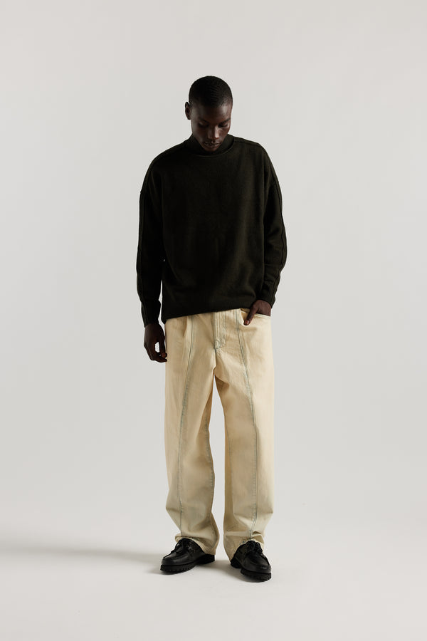 Front of the Mid Blue Fade with Ecru Tint Impact Denim Pant in lightweight denim, front view showing wide tapered leg, elastic waistband, and traditional front pockets.