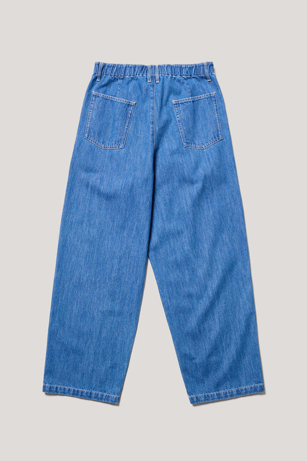 Flat back of the Mid wash Impact Denim Pant highlighting back patch pockets and relaxed silhouette.