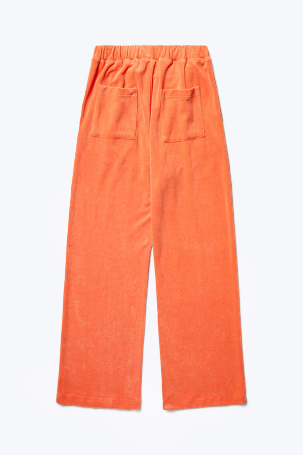 The back of the Prone Terry Towelling Track Pant Tangerine a straight leg track pant with an elasticated waist band and two back pockets. 