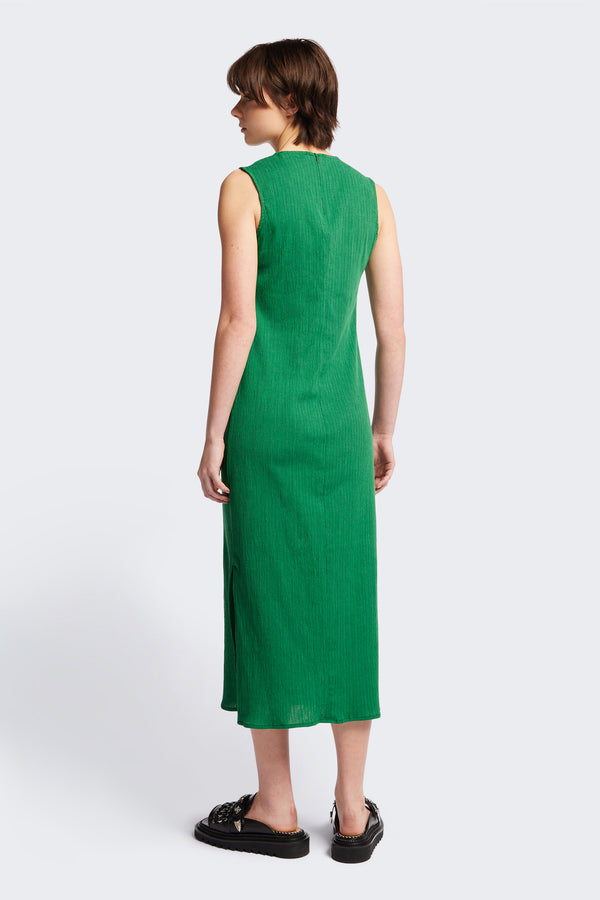 Back of The Level Crinkle Dress in Green, a loose slim fit and stylish long length. Cut from lightweight crinkled crepe fabric this dress exudes everyday sophistication. Available in 4 sizes.