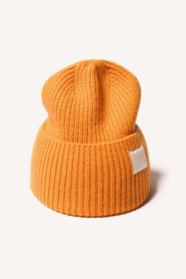 Flat Front shot of ribbed knit beanie showing fit and texture in Dutch Orange
