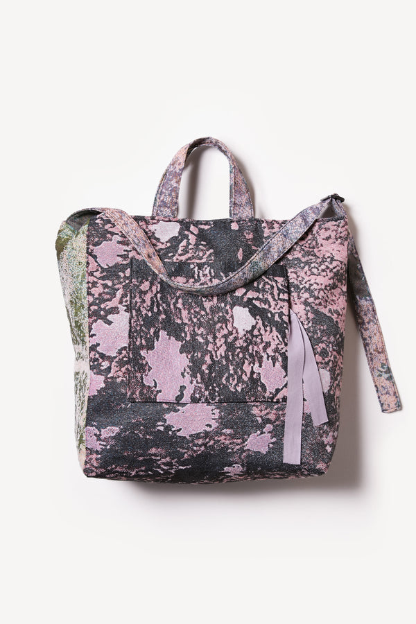 Flat Front of Kloke jacquard tote bag in real tree camouflage with dual handle lengths and external pockets