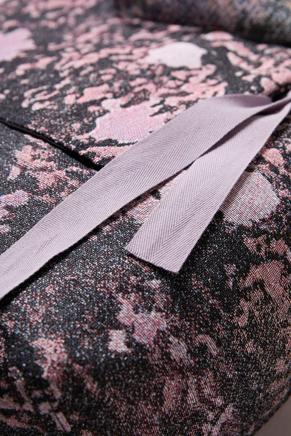 close up fabric shot of Kloke jacquard tote bag in real tree camouflage with dual handle lengths and external pockets