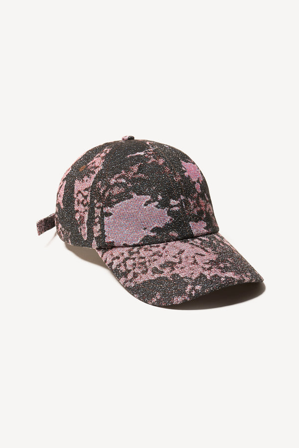 Flat front view of the Orbital Jacquard Cap in Purple Print 