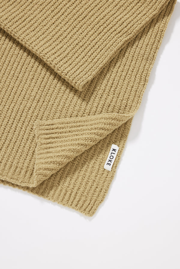 Close-up of reverse cardigan knit texture on the Chartreuse Within Scarf in traceable RWS certified Merino wool