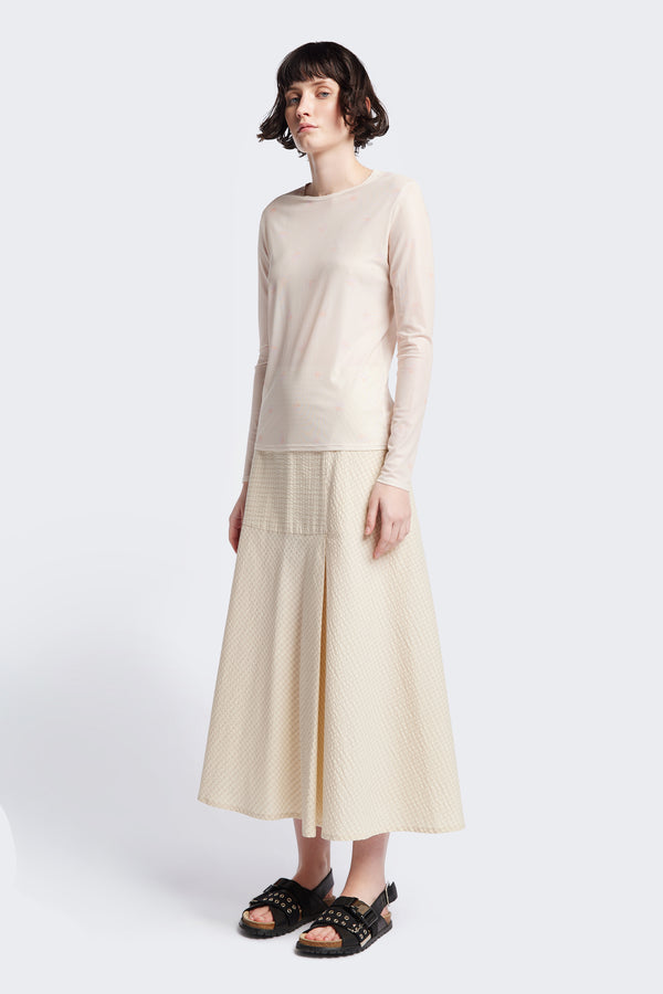 The Abroad Panel Skirt, fitted at the waist with a bias-cut maxi silhouette, made from 100% cotton in Ecru Seersucker. Features panel details, side pockets, and an invisible back zip. Available in 6 sizes