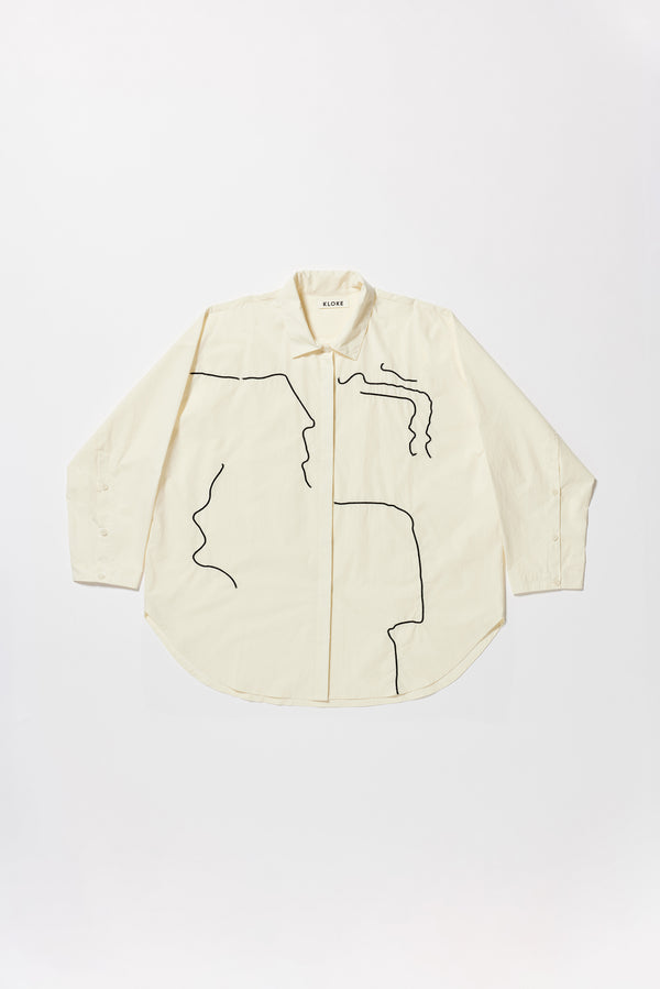 Ecru off White Ache Embroidered Shirt flat front view, with embroidered motifs, long sleeves, and built-in collar