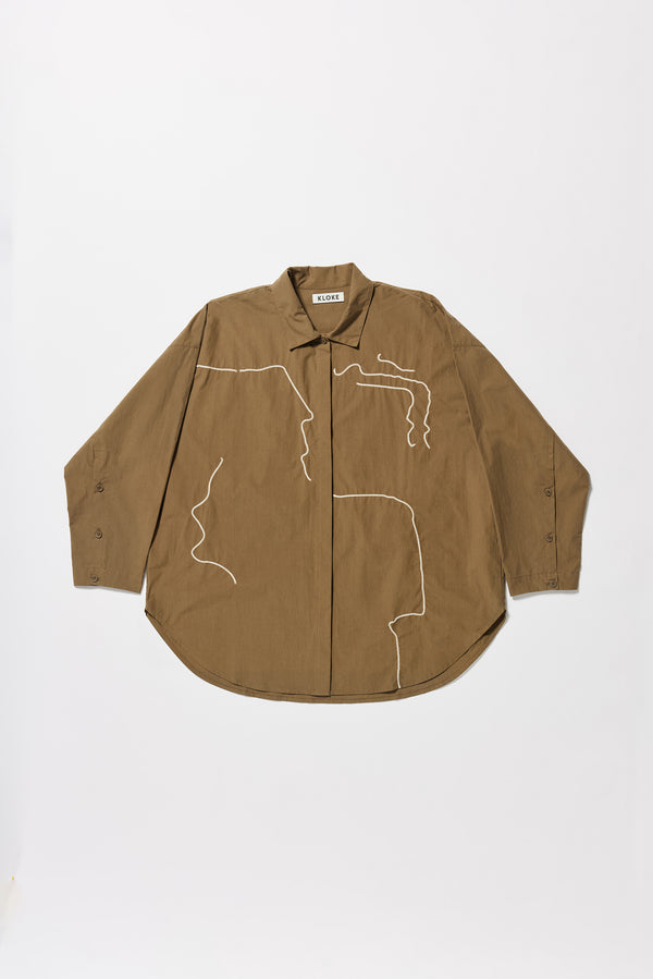 Olive green/brown Ache Embroidered Shirt flat front view, with embroidered motifs, long sleeves, and built-in collar