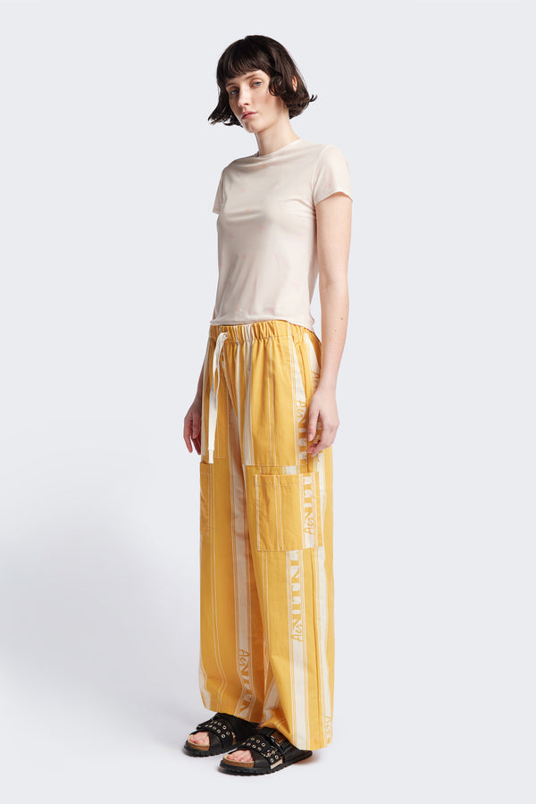 Front of the Aer Vital Print pant, a lightweight effortless summer style featuring an elastic waistband with a self-tie pull