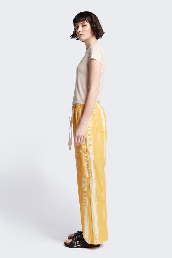 Side of the Aer Vital Print pant, a lightweight effortless summer style featuring an elastic waistband with a self-tie pull