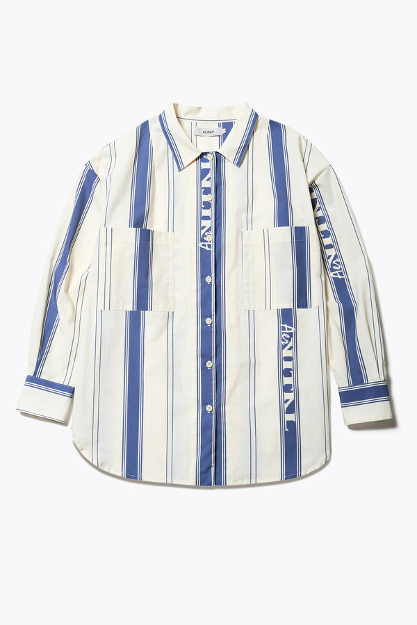 Flat front of the Kloke Aer Vital Shirt featuring a relaxed fit, double front chest pockets, and a curved hemline, in this season’s signature Aer Vital Print