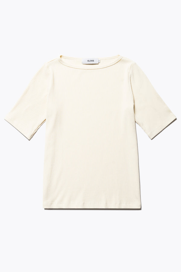 Flat Front of the arbour top, a slim-fitting t-shirt-style top, in pale yellow. With a boat neckline and single bind trim, made from fine Japanese rib knit with slight stretch, perfect for casual and stylish outfits