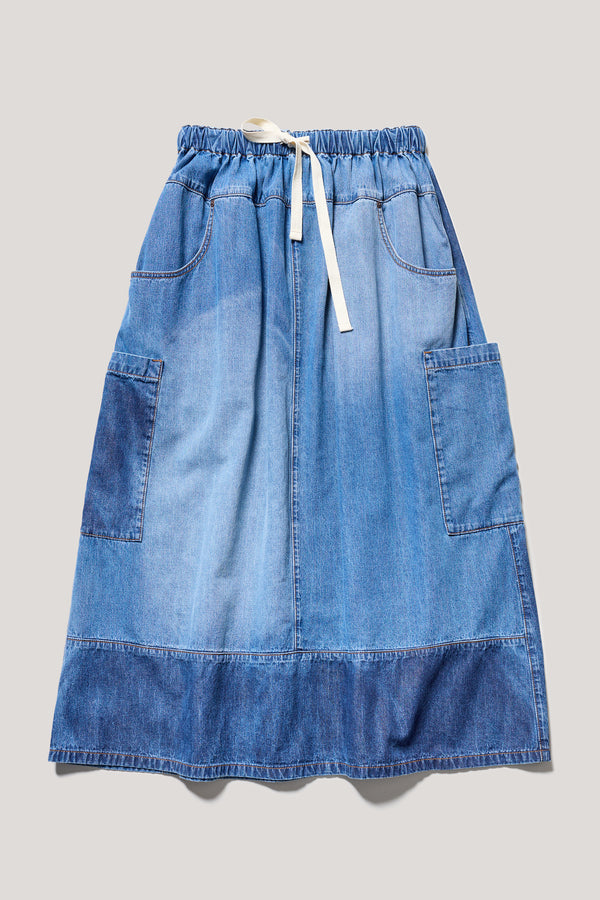 Flat Front of Dark/Mid Blue Fade Aria Panel Skirt showing panelled denim construction, scoop pockets, and elasticated waistband.