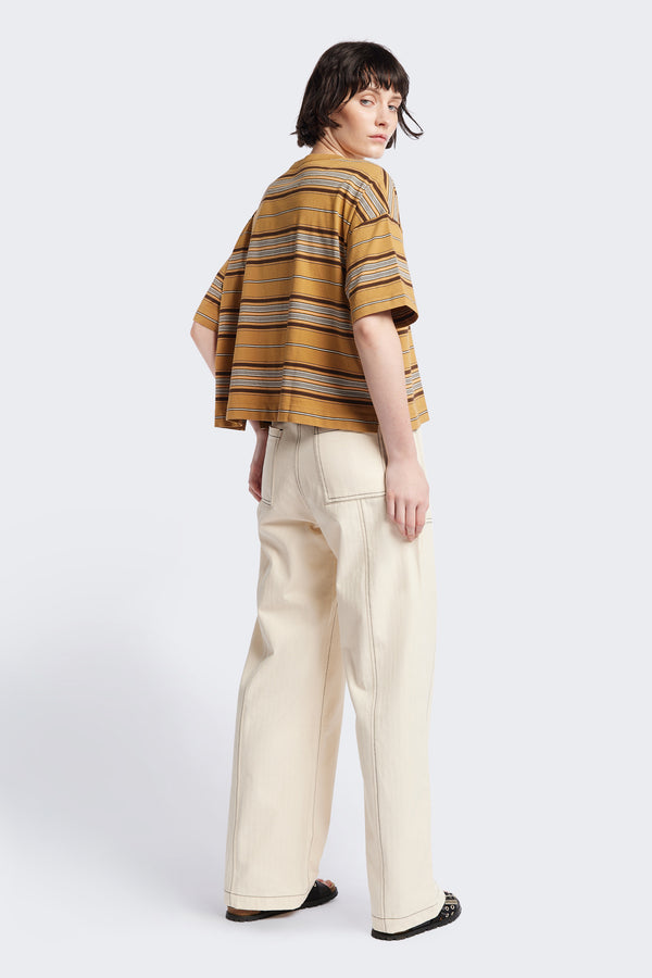 The back of the Ascent T-Shirt, a relaxed boxy top with elbow-grazing sleeves, featuring a Kloke-designed ticking stripe pattern in Tan. The top is made from 100% soft, durable combed cotton, balancing structure and drape. Available in 5 sizes.