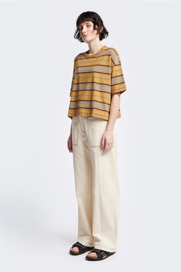 The Ascent T-Shirt, a relaxed boxy top with elbow-grazing sleeves, featuring a Kloke-designed ticking stripe pattern in Tan. The top is made from 100% soft, durable combed cotton, balancing structure and drape. Available in 5 sizes.