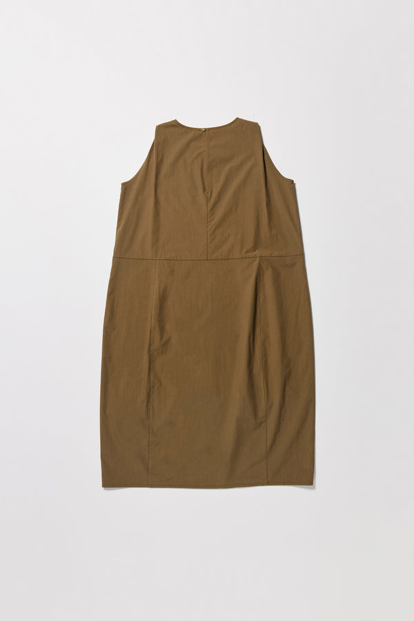 Flat back of the olive  Aureole Dress front view showing panelled detailing and relaxed skirt with front inseam split
